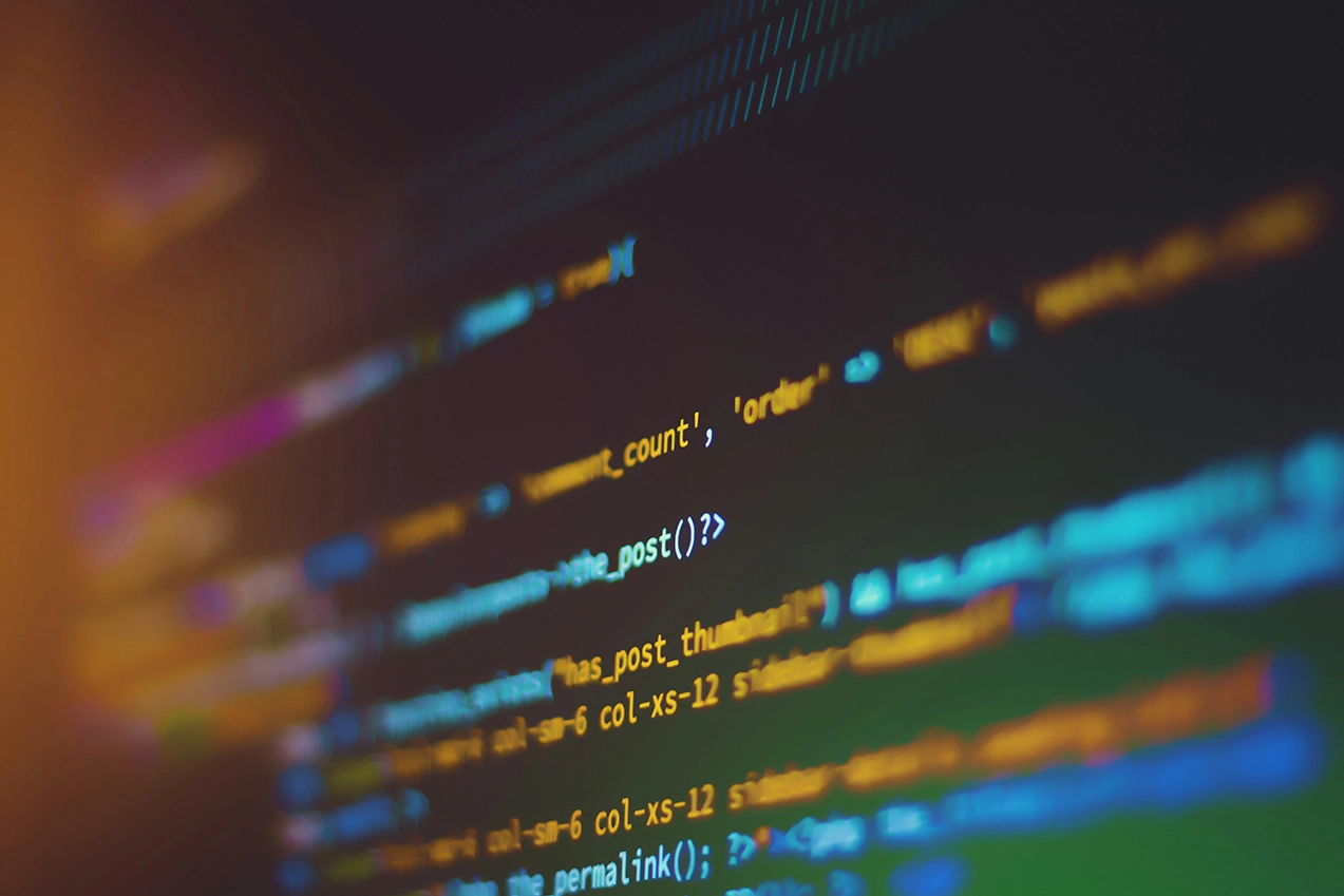 Custom WordPress Development featured image_A photo of colorful lines of code