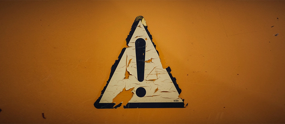 WordPress Speed Optimization image_a worn alert sign against an orange background