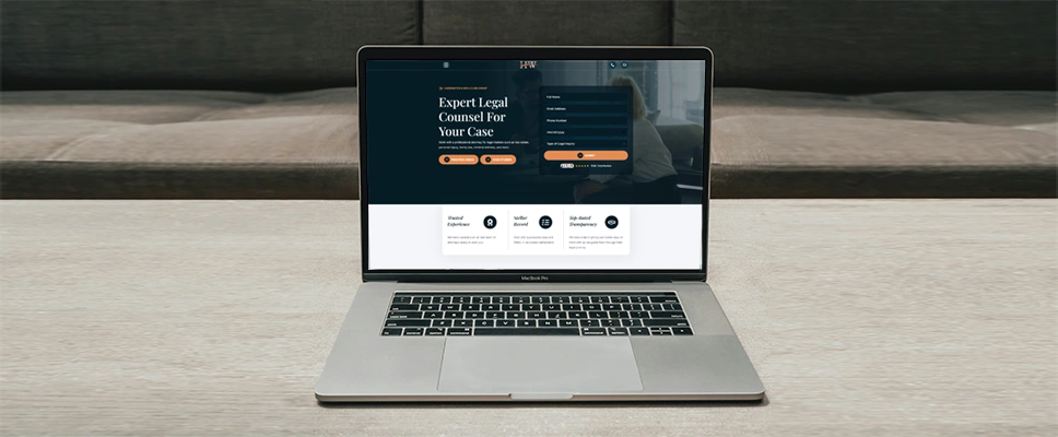 Custom WordPress Design service featured image_Homepage of a custom built law firm site on a laptop