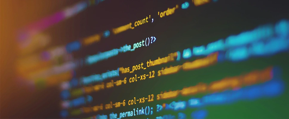 Custom WordPress Development featured image_A photo of colorful lines of code